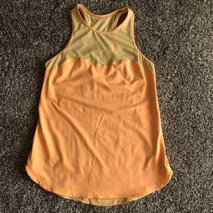 Orange Lululemon mesh and spandex workout shirt